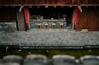 Yunshui Ruyi Travel And DL Tulou Culture B&B - bar