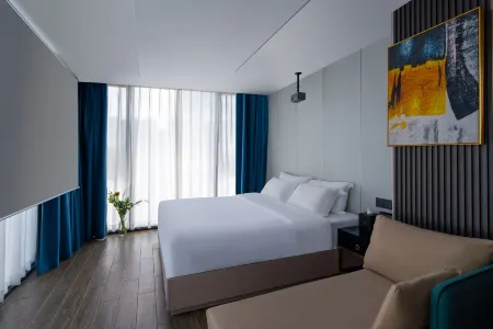 Yibai Light Luxury Hotel (Shenzhen Bao'an Haiya Binfencheng Branch) Отели рядом с достопримечательностью «Bao'an Science and Technology Museum»