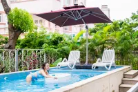 Flower Building Xianghai Hanshe Homestay (Beihai Yintan International Passenger Port) - رومانسي