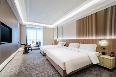 Jinjiang Bay Express Hotel (Dongshi Town Center) Отели рядом с достопримечательностью «Shuzhen Gymnasium»