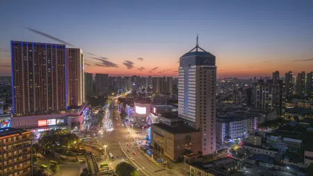 Changzhou Soluxe International Grand Hotel (Qingguo Lane Wuyue Plaza) Отели в г. Чанчжоу