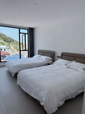 Houlongbo Homestay Отели рядом с достопримечательностью «Три клапана»