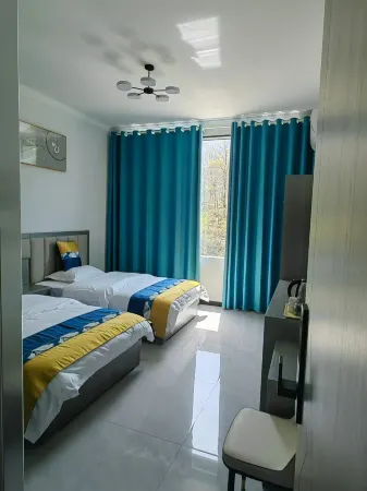 Huoshan Jiuxian Bieyuan Farm Отели рядом с достопримечательностью «Dabie Mountain Main Peak (Baima Main Peak)»