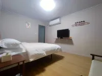 Man xing Xiang Homestay 이닝 호텔