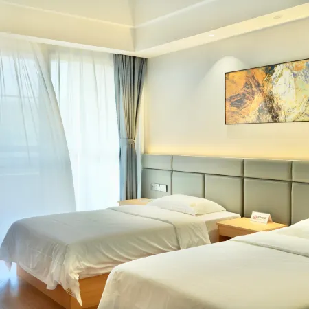 Wuzhishan Rushixin Hotel Отели рядом с достопримечательностью «Taipingshan Pubu»