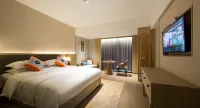 SUITES BY WYNDHAM CHANGSHA MEIXI LAKE Hotel in zona Hunan International Economics University Commerce Department