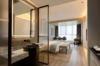 Yunmu Hotel (Luzhou Bubu Hi-Tech World Shop) Hotel a 