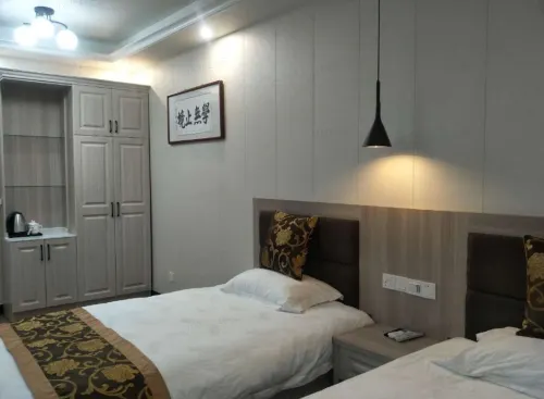 Zhenzhen Business Express Hotel Hôtels à : Zongyang