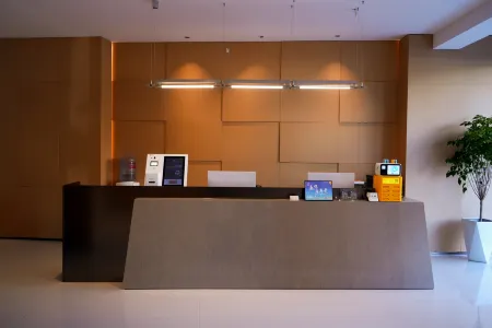 Grand Hotel Five Rivers Rainbow Avenue shopping mall shop Отели в г. Ухэ