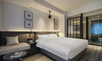 WondIsland Mandao Hotel (Leshan Zhanggongqiao Food Street Branch)