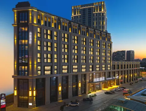 Shangru Hotel (Harbin West Station West Square Urban Rural Road Subway Station Branch) Отели рядом с достопримечательностью «Tian Jiabing Gymnasium»