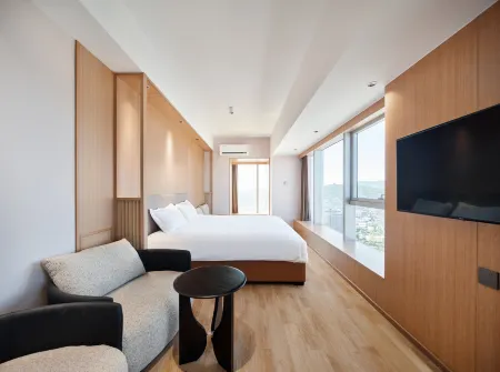 BE WITH YOU ROOMS Отели рядом с достопримечательностью «Wenjing College Yantai University»