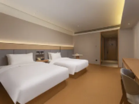 โรงแรม JI (สถานีรถไฟเจิ้นเจียง) โรงแรมในเจิ้นเจียง