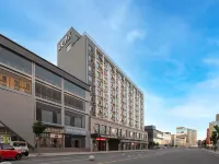 Qiuguo Hotel (Olympic Sports Center) Hotel dekat Jalan Anning