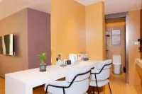 Luoshan Golden Sunshine Star Ji Hotel