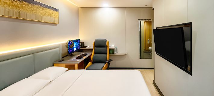 Jingfang E-Sports Hotel (Yangzhou Baoying Huaijiang Avenue Taishan East Road) Отели в г. Баоин