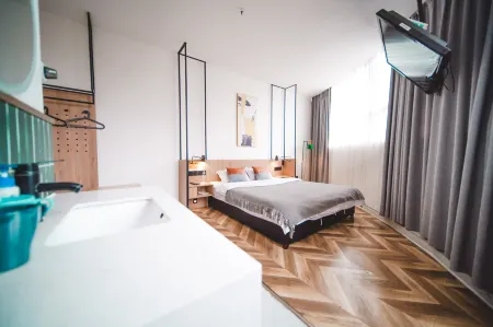 POSHPACKER Local Tea Hostel Отели рядом с достопримечательностью «Sichuan Indoor Stadium»