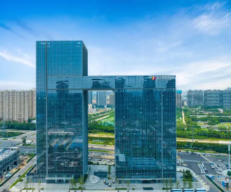 Zhengshang Jianguo Hotel Zhengzhou East Railway Station Отели рядом с достопримечательностью «Henan Agricultural University (Longzihu Campus)»