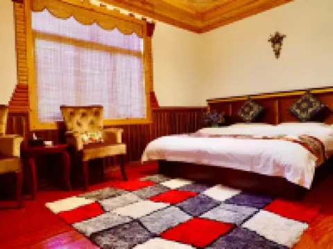 Jinuo Shanzhuang Hostel โรงแรมในเฮ่ยซุ่ย