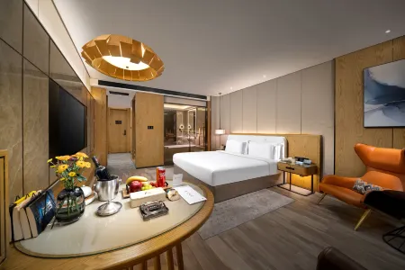 Daqing Royal Maple Hotel (Saltu Dawn Lake Shop ) Отели рядом с достопримечательностью «Daqing Times Square»