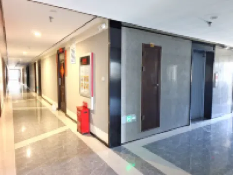 智美·輕居影音民宿（駐馬店高鐵西站凱旋廣場店）