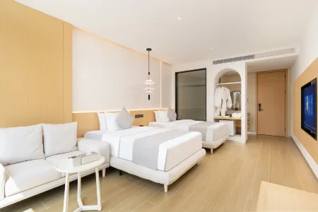 Wanningmu Seaside Hotel Отели рядом с достопримечательностью «Xinglong Tropical Garden»