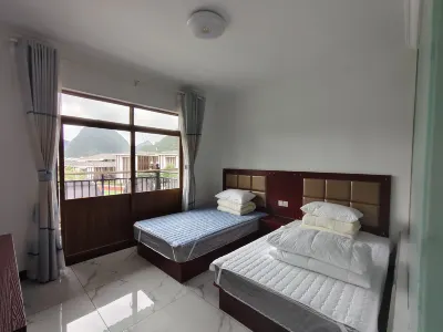 Big and small seven holes + Xingxin Garden rest station Hotel a Libo