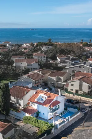 Gold Coast Photography Inn Отели рядом со станцией Monte Estoril