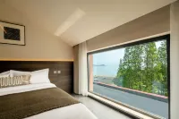 Yangchuan Design Art | Sea View Private Hot Spring Homestay, Yangkou Beach, Laoshan Scenic Area - balneario
