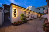상수야위안매이쑤(우전 시자관광단지店) 퉁샹 식물원 주변 호텔