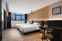 SFEEL Designer Hotel (Zhangjiasi Subway Station Branch, Chengdu High tech Zone) Các khách sạn gần Sichuan Normal University Training Hall