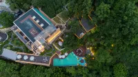 Zhangjiajie Qishi Li Cave Homestay (National Forest Park Flagship Store) Hotel in zona Huanglong Cave