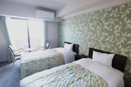 Sawa Hotel Отели рядом с достопримечательностью «Oike Park»