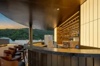 暉廷雲居高空泳池度假酒店（西雙版納景洪告莊西雙景星光夜市店） - 酒吧