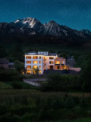 Qiwu Lan KIOWLAN Snow Mountain Retreat Manor - bar