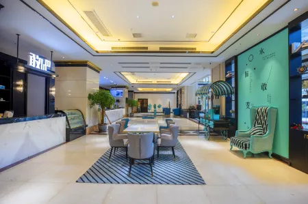 Xana Hotelle (Shishi Municipal Government Dehui Plaza) Отели рядом с достопримечательностью «Quanzhou Textile Garment Vocational Institute»