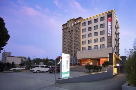 QIANNA HOTEL JOURNEY (Xingyang Municipal Government) Отели рядом с достопримечательностью «Xingyang People's Park»