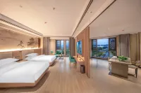 Menghai Boting Hotel (Xishuangbanna Menghai Mengbala International Resort Rainforest Avenue Branch) Hotels in Menghai