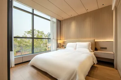 Muyun Country Homestay Hotel dekat Guqiao Street