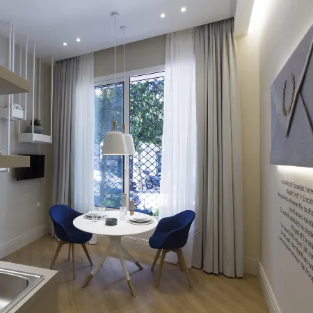 Great Living Koukaki Отели рядом с достопримечательностью «Торговый центр Athens Heart»