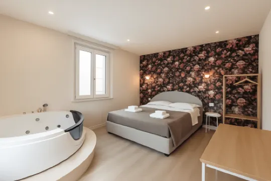 AURELIA GARDEN ROOMS by TEI