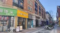 Xinxin Movie Apartment (Baolong Love Town)