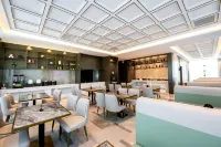 Huanren Zhongkun Hotel - parking