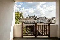 Huangshan Yijing Huizhou Intangible Cultural Heritage Homestay (Xiuli, Hongcun) - إقامة ريفية