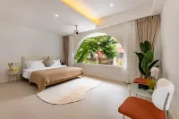 Haikou Chuqing Homestay (Haidiandao Hainan University) - Romantic