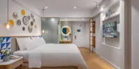 O.LIVE social Hotel (Dongfang Xingang Branch) - Xiexiang Sunshineダブルベッドルーム