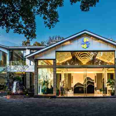 普洱萬畝茶園度假酒店(茶博覽苑景區店) Hotel Exterior