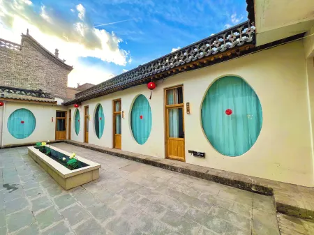 Banshan Holiday Homestay (Pingyao Ancient City Branch) Отели рядом с достопримечательностью «Ming and Qing Dynasty Ancient Street»
