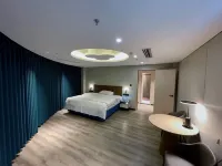 Jiujiang Meihao EZZI Hotel (Huochezhan Jiujiang Xueyuan)