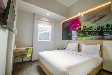 Cleo Hotel Jemursari Surabaya Отели рядом с достопримечательностью «Petra Christian University»